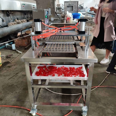 Máquina de produção automática de doces para aplicação de doces