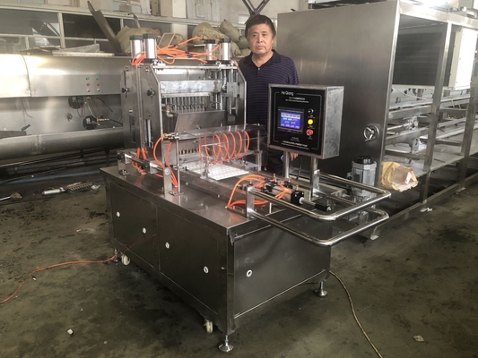 Máquina de produção automática de doces para aplicação de doces